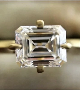 9X7MM East West Emerald Cut Moissanite Ring 10K Yellow Gold Wedding Ring - Foto 1 di 6