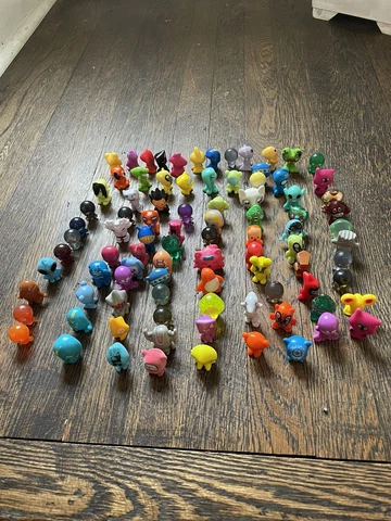 Moshi Monsters Figures Lot of 87 Misc Loose Gold Figurine Collection Cover