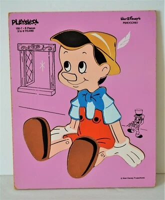 Vintage Playskool Pinocchio Wood Puzzle HTF 190-7 8 Pieces Pink Background  - Image 1 of 4