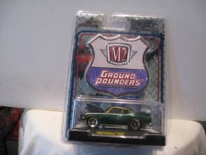 M2 MACCHINE R11 1:64 GROUND POUNDERS 1969 PONTIAC GTO GOLD TRIM CHASE - Foto 1 di 2