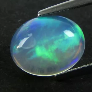 2.56Cts Natural Earth Mined Color Play Opal Ethiopian Oval Cabochon Gem REF VOD - Picture 1 of 4