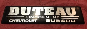 Dealer Emblem DUTEAU CHEVROLET SUBARU LINCOLN NE 70s 80's 90’s NAME PLATE CAMARO - Picture 1 of 7
