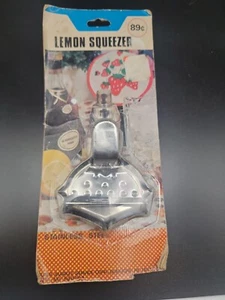 New in packaging! Lemon Squeezer By Supermarket Service Corp-Stainless steel - Picture 1 of 4