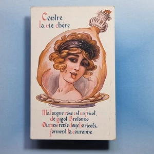Postal R Wuyts C1917 Art Nouveau Glamour Niña Alto Costo de Vida Lengua Saucy - Imagen 1 de 2