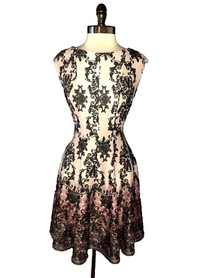 GABBY SKYE Size 8 A-Line Dress Pink Black Floral Sleeveless Stretch Knit - Image 1 of 4