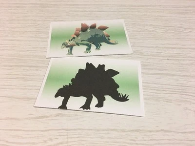 Juego de actividades laminadas a juego con sombras de dinosaurio - suministros de enseñanza Foto 1 de 4