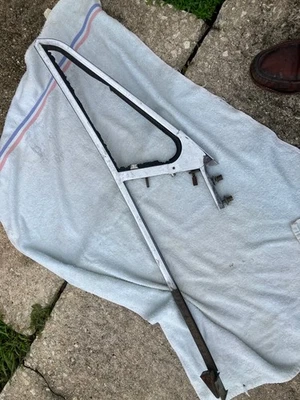 MGBGT,MGCGT LEFT Vent Glass Frame Early Chrome over Brass with Upper Hinge - Image 1 of 4