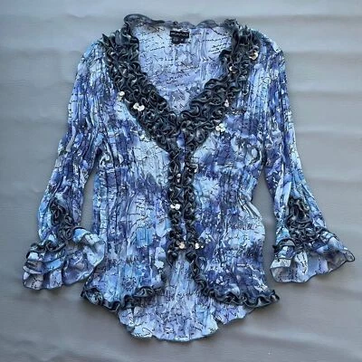 Blusa azul piano para mujer Foto 1 de 4