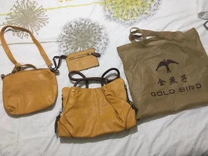 Uccellino dorato. Set di borse donna - Foto 1 di 12