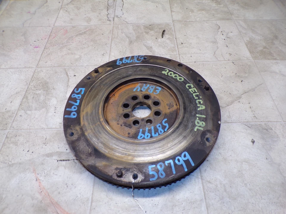 2000-2005 TOYOTA CELICA 98-07 COROLLA 03-07 MATRIX MANUAL TRANSMISSION FLYWHEEL - Image 1 of 4