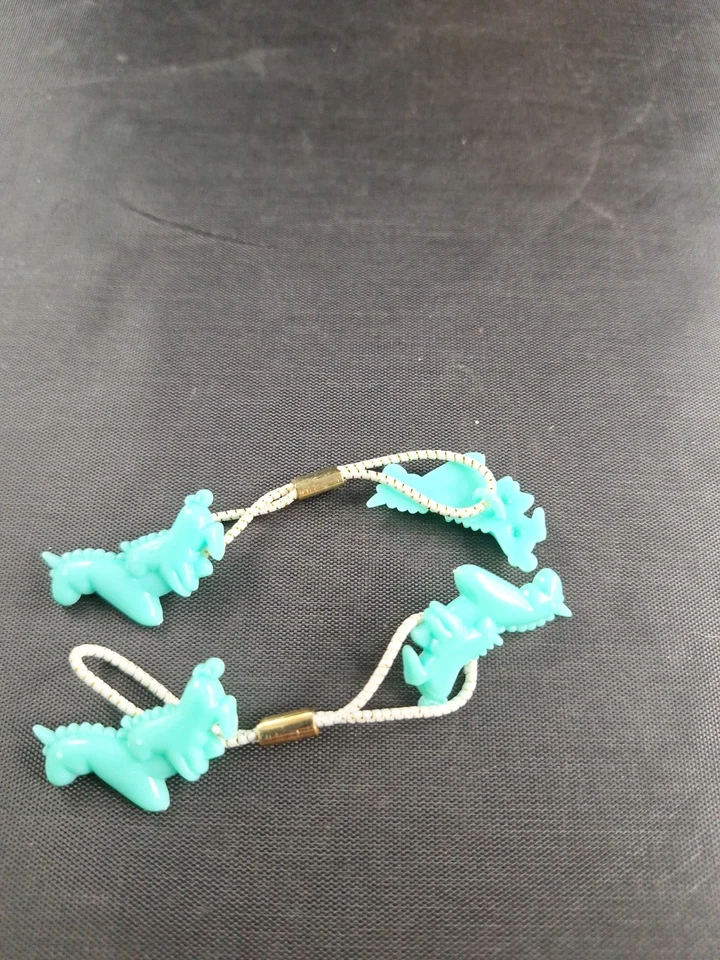 *2* Soportes de cola de caballo UNICORNIO verde de colección años 90 SIN USAR *7-H Foto 1 de 1