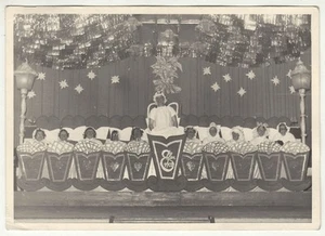1940s Offenbach carnival, grown-ups in baby cradles, Germany - Picture 1 of 2