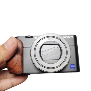 Sony Cyber-Shot RX100 V Digital camera 20.1MP 4k [MINT] + Accessories+ Grip + 2 - Picture 1 of 8