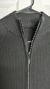 Suéter acanalado negro con cremallera brillante y agujeros en los brazos. Mujer M. Sin Etiqueta - Imagen 1 de 9
