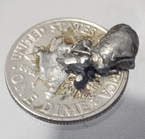 1993 P Dime Error/ Dime with melted dime stuck to the back in display case Cover