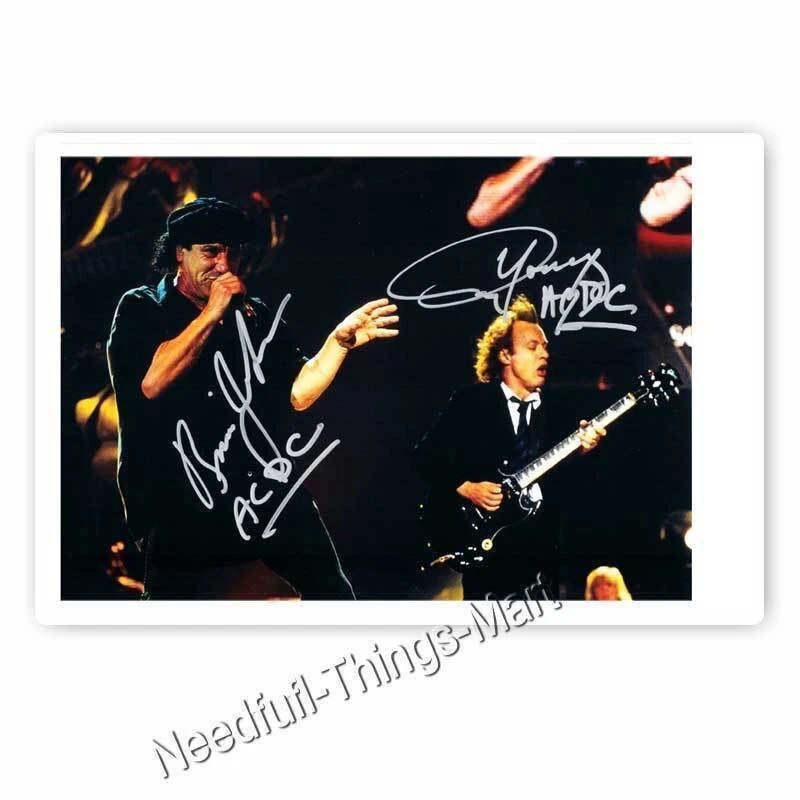 ACDC signiert Angus Young & Brian Johnson - Autogrammfotokarte  - Bild 1 von 1