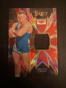 Brutus Creed 2024 Panini Select WWE SPARKS RED PRIZM RELIC Card /99 - Picture 1 of 2