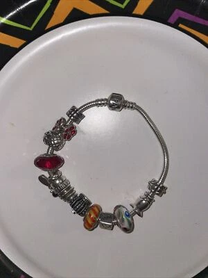 AUTHENTIC PANDORA STERLING SILVER 925 ALE BRACELET WITH 14 CHARMS - Image 1 of 2