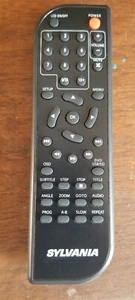 ☆LIMPIO Y PROBADO☆ Sylvania OEM Control remoto SDVD9019-B para reproductor de DVD portátil  - Imagen 1 de 12
