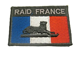 ECUSSON P.N LE RAID OPEX SCRATCH AU DOS 80MM X 55MM ETAT EXCELLENT - Picture 1 of 1