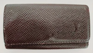 AUTÉNTICO BOLSO PORTA CUATRO LLAVES LOUIS VUITTON TAIGA GRANATE CA0967 - Imagen 1 de 11