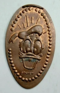 DONALD DUCK FACE WITH RAYS Pressed Penny ~ MGM0074 / Walt Disney World - Picture 1 of 1