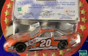 2001 WINNERS CIRCLE - CAR +UNIFORM PIECE - NASCAR #20 - TONY STEWART - AUTHENTIC - Picture 1 of 6