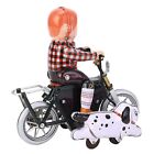 Zabawka zegarowa retro chłopiec spacer pies rowerem wind up blaszana zabawka do kolekcji