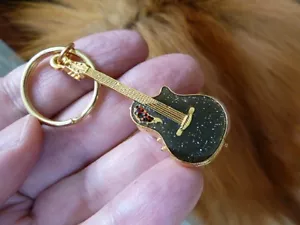 (M-303-B) SCEGLI 1 DI 4 COLORI OVATION CHITARRA ROUNDBACK ANELLO PORTACHIAVI GIOIELLI WOW - Foto 1 di 4
