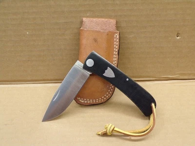 VINTAGE A.G. RUSSELL COWBOY FOLDING KNIFE w/ GUN GEAR LEATHER SHEATH ~ NOS ! - Image 1 of 4