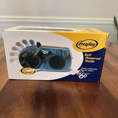Wind Up Emergency Radio With Solar Power Freeplay Clear Blue Self Powered S360. - Image 1 of 4