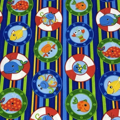 Blank Quilting Colorful Ocean Animals in Circles on Stripe Background 1.25 Yds - Image 1 of 4
