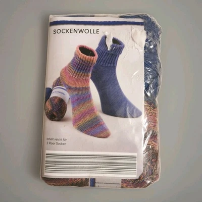 4 x 50 g Gründl Sockenwolle, 4-fädig inkl. Nadelspiel + Anleitung, blau + lila - Bild 1 von 4