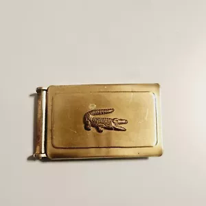Cinturón vintage Lacoste hebilla de trinquete logotipo de cocodrilo Izod para cinturón palmeado de 1" de ancho - Imagen 1 de 5