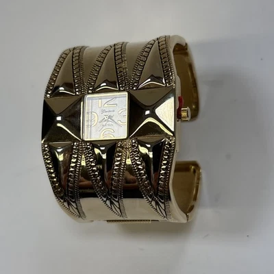 Reloj pulsera de cuarzo grueso dorado de lujo para mujer brazalete ancho brazalete pulsera abierta. Foto 1 de 4