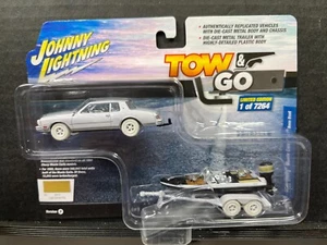 1/64 JOHNNY WHITE LIGHTNING TOW & GO 80 CHEVROLET MONTE CARLO & BOAT GOLD CHASE - Picture 1 of 2