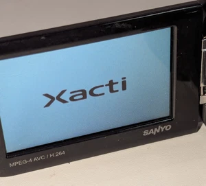 FOTOCAMERA DIGITALE SANYO XACTI VPC-GH2 Full HD TESTATA FUNZIONA batterie nuove e chg. - Foto 1 di 13