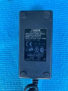 DVE Power Switching Supply Adapter AC +12V 1,5A DSA-0151D-12 P/N: SA121A5I - Bild 1 von 8