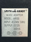 SMITH AND HARDY AC/DC ADAPTER  240AC INPUT 12VDC OUT @ 300ma