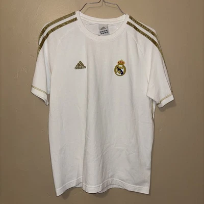 Camiseta Adidas Real Madrid Gráfica ADN Blanca W. Rayas Doradas Talla S  Foto 1 de 4