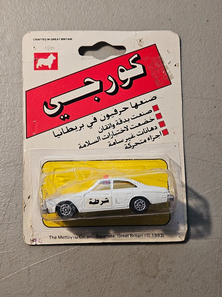 1983 CORGI JUNIORS 1:64 ARABIC BUICK REGAL POLICE CAR WHITE IN PACKAGE - Image 1 of 4