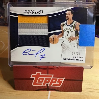 PARCHE JERSEY PREMIUM AZUL GEORGE HILL INMACULADO PANINI 2024-25 AUTOMÁTICO/25  Foto 1 de 2