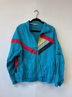 Chaqueta cortavientos vintage Le Coq Sportif para hombre verde azulado bloque de color años 90 Foto 1 de 4