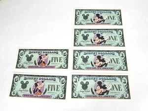 Lote de dólares Disney 1987 números de serie secuenciales de $1 y $5 UNC como nuevo Goofy Mickey - Imagen 1 de 24