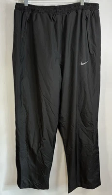 NIKE Pants Mens size XL Golf Storm Fit Black Zip Ankle Waterproof Wind Resistant - Image 1 of 4