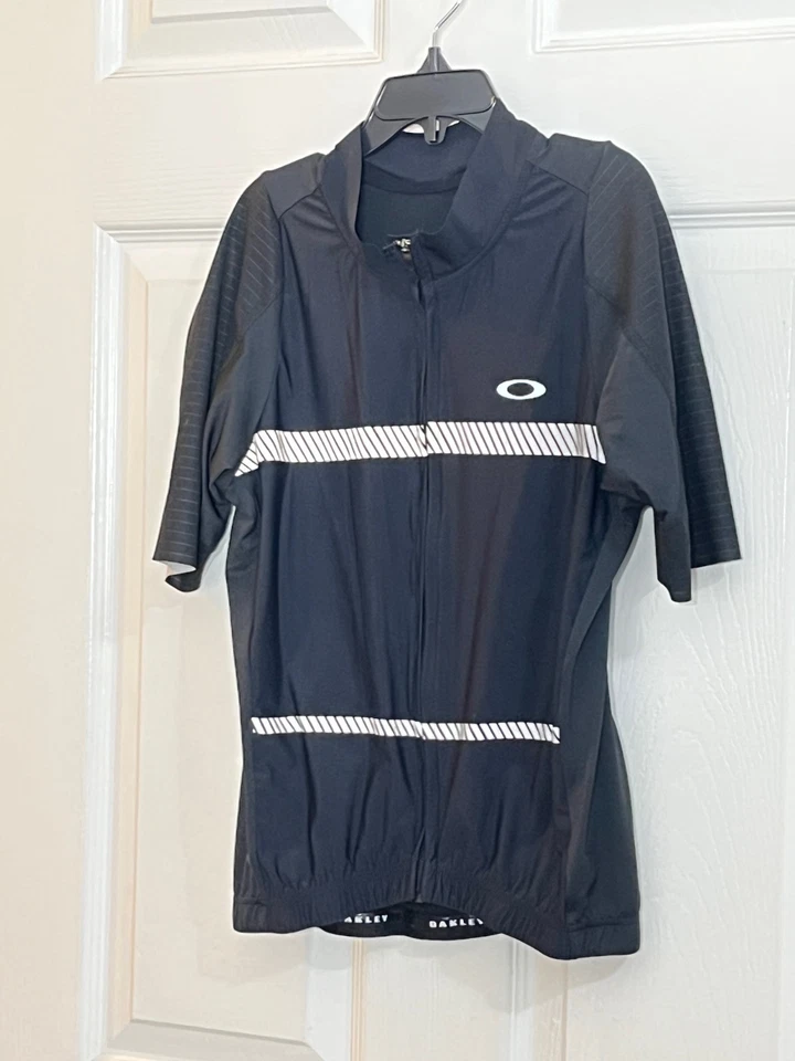 Jersey de ciclismo Oakley para jóvenes Race Fit niños S negro bolsillos reflectantes hecho en habitación Foto 1 de 4