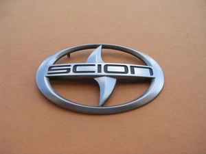 05 06 07 08 09 10 SCION TC FRONT GRILLE EMBLEM LOGO BADGE SIGN SYMBOL OEM A46525 - Picture 1 of 3