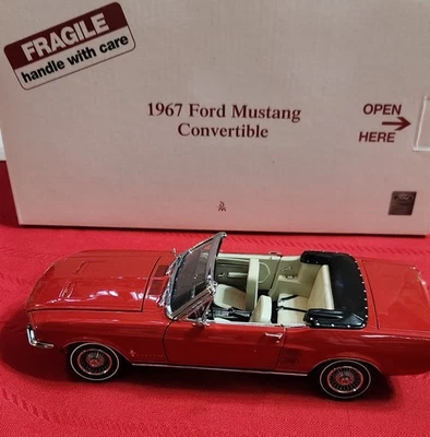 Danbury Mint  1967 Ford Mustang Convertible in Candy Apple Red in 1:24 scale - Image 1 of 4