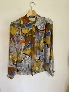 Blusa de colección de los años 80 con estampado de rostros pintados de percepción moño almohadillas para el hombro Reino Unido 10/12 - Imagen 1 de 13