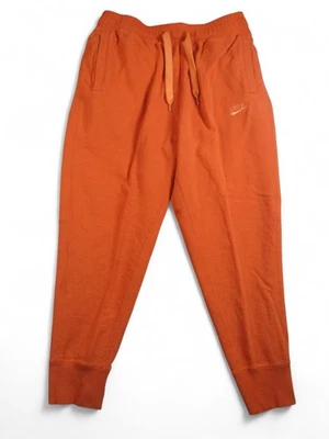 Pantalones deportivos Nike para hombre grandes naranja bordado Swoosh bolsillos con cordón Foto 1 de 4
